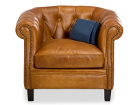 Fauteuil chesterfield cuir cognac accoudoirs cloutés
