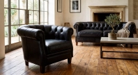 2 seater Chesterfield leather sofa black studded armrests