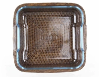 Square Pyrex dish with brown rattan stand