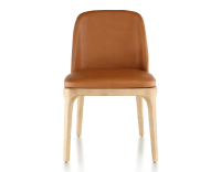 Designer chair natural stained wood and caramel leather