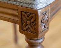 Antique Louis XVI style chair wood stained in an antique style and light grey fabric
