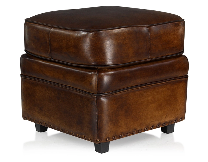 Pouf cuir marron soutenu bord clouté