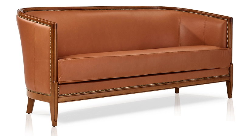 Antique 3 seater sofa with moulded armrests antique stained wood and chestnut leather