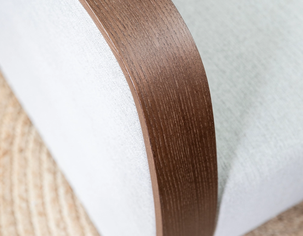 Designer armchair dark brown stained wood and natural beige fabric