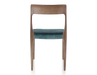 Chaise scandinave bois teinte marron foncé assise tissu velours bleu pétrole