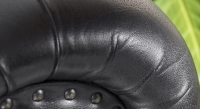 2 seater Chesterfield leather sofa black studded armrests