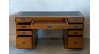 Bureau marine double caissons 9 tiroirs bois teinte merisier et cuir vert