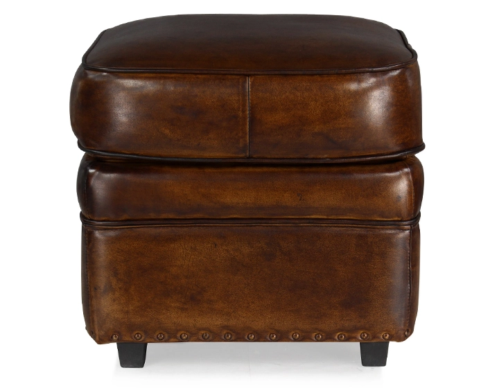 Pouf cuir marron soutenu bord clouté