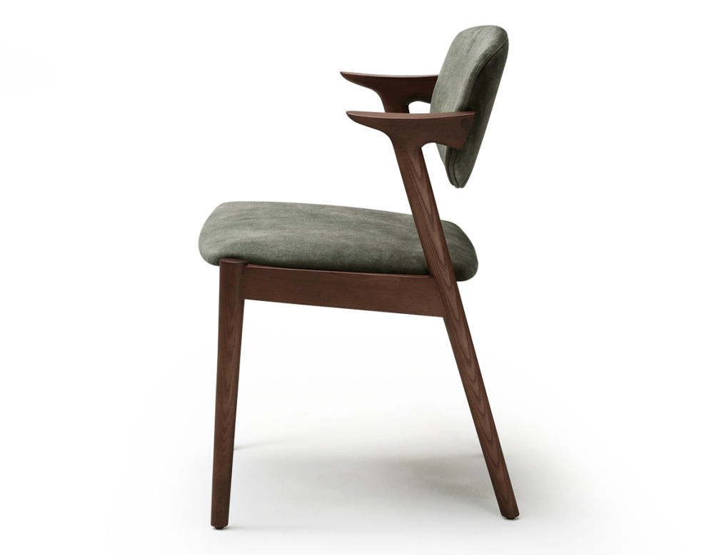 Scandinavian chair dark brown stained wood with forest green velvet seat.