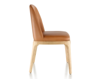 Designer chair natural stained wood and caramel leather