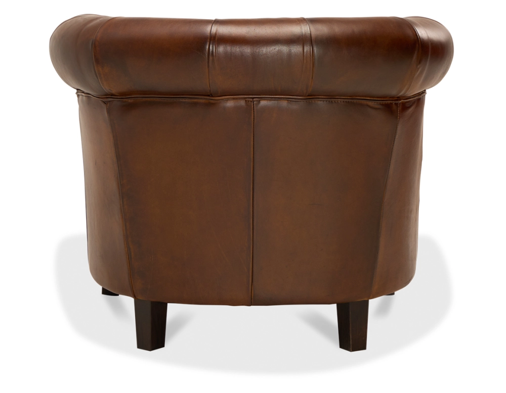 Fauteuil chesterfield cuir marron vintage accoudoirs cloutés