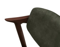 Scandinavian chair dark brown stained wood with forest green velvet seat.
