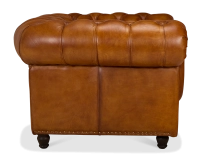 Fauteuil chesterfield cuir marron clair accoudoirs cloutés