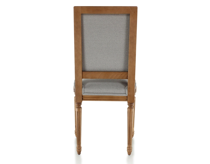 Antique Louis XVI style chair wood stained in an antique style and light grey fabric