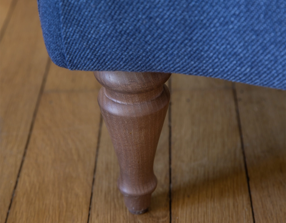 Toad armchair with armrests walnut-stained wooden legs and navy blue high-back fabric