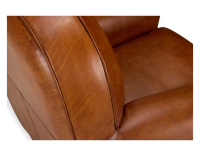 Fauteuil club cuir marron clair accoudoirs cloutés