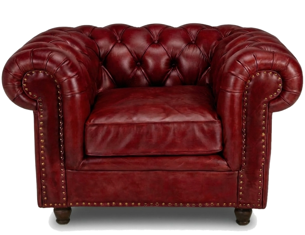 Fauteuil Chesterfield cuir rouge carmin accoudoirs cloutés