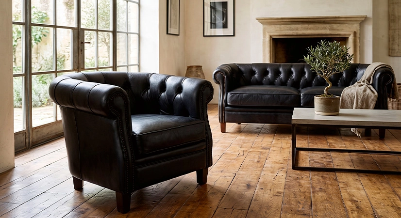 2 seater Chesterfield leather sofa black studded armrests