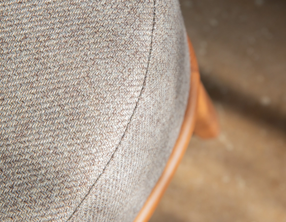 Designer armchair caramel leather and brown fabric