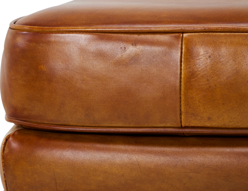 Pouf cuir cognac bord clouté