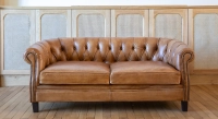2 seater Chesterfield leather sofa cognac studded armrests