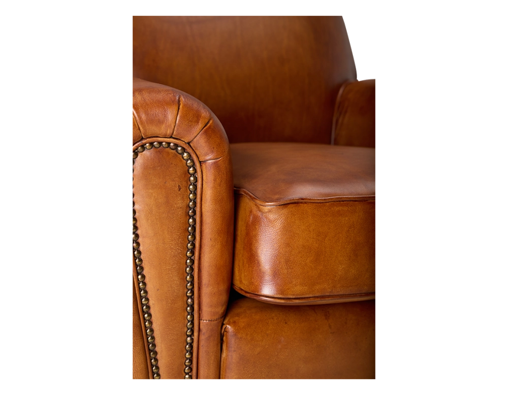 Leather club armchair light brown studded armrests