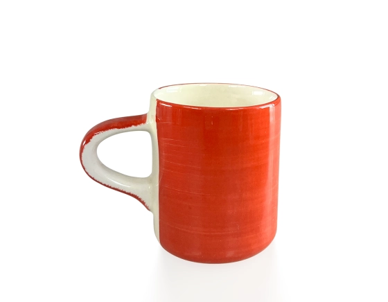 Plain red ceramic coffee cup