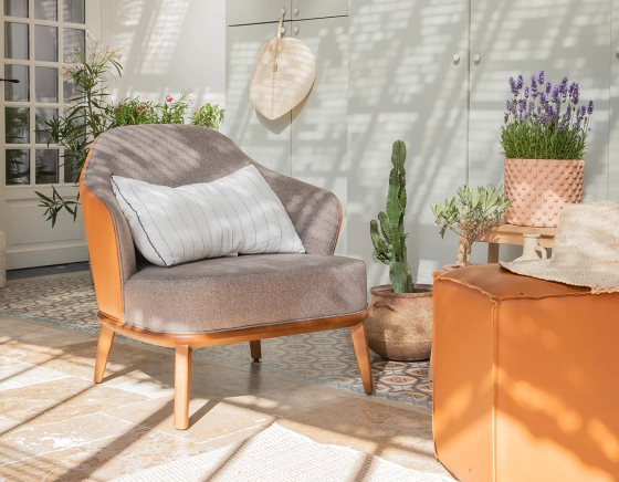 Designer armchair caramel leather and brown fabric